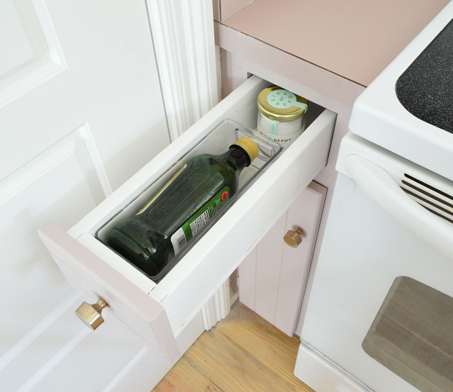 Before Photo Of Narrow Drawer Wide Enough To Only Fit One Oil Bottle