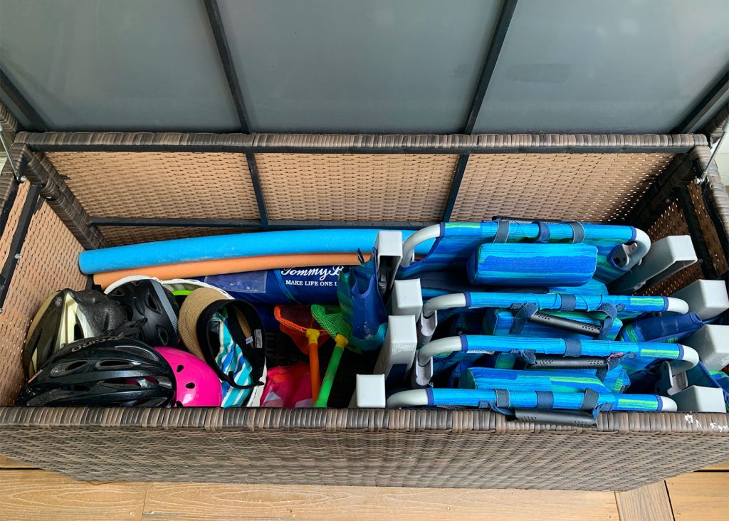 Inside Of Storage Bin With Beach Chairs And Toys