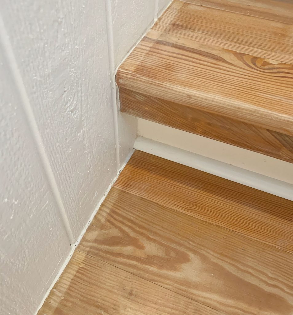 Close Up Photo Of Wood Stairs With Discolored Border