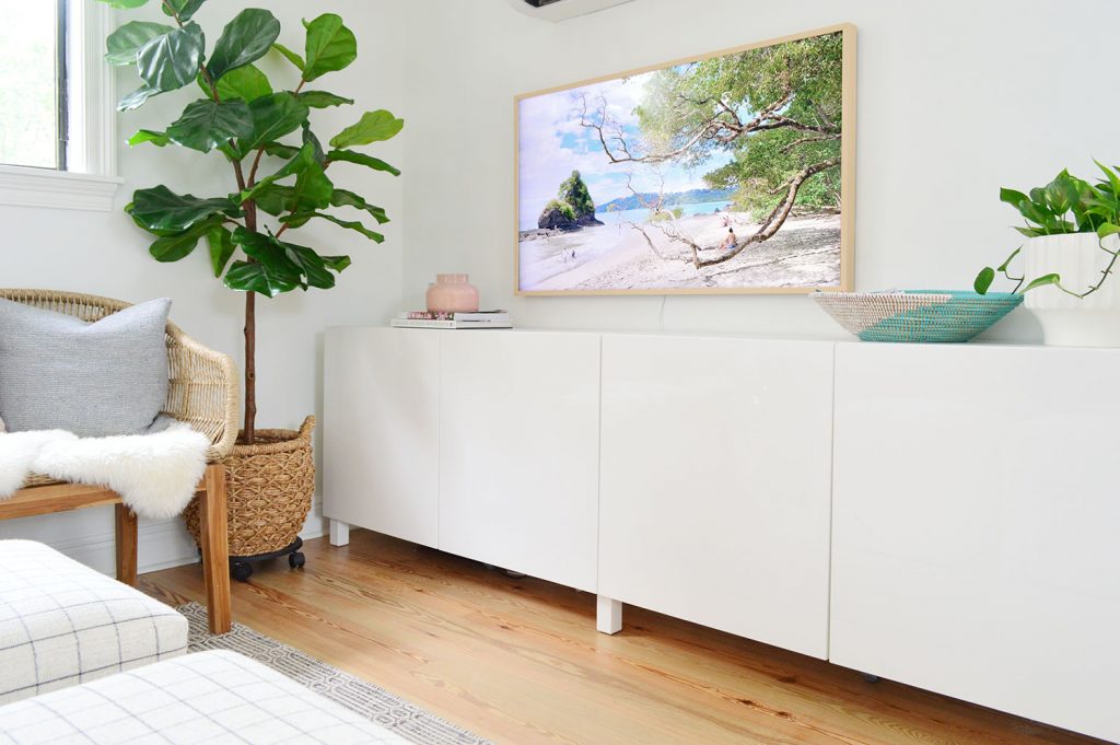 Two White Ikea Besta Cabinets As Long Media Console Under TV