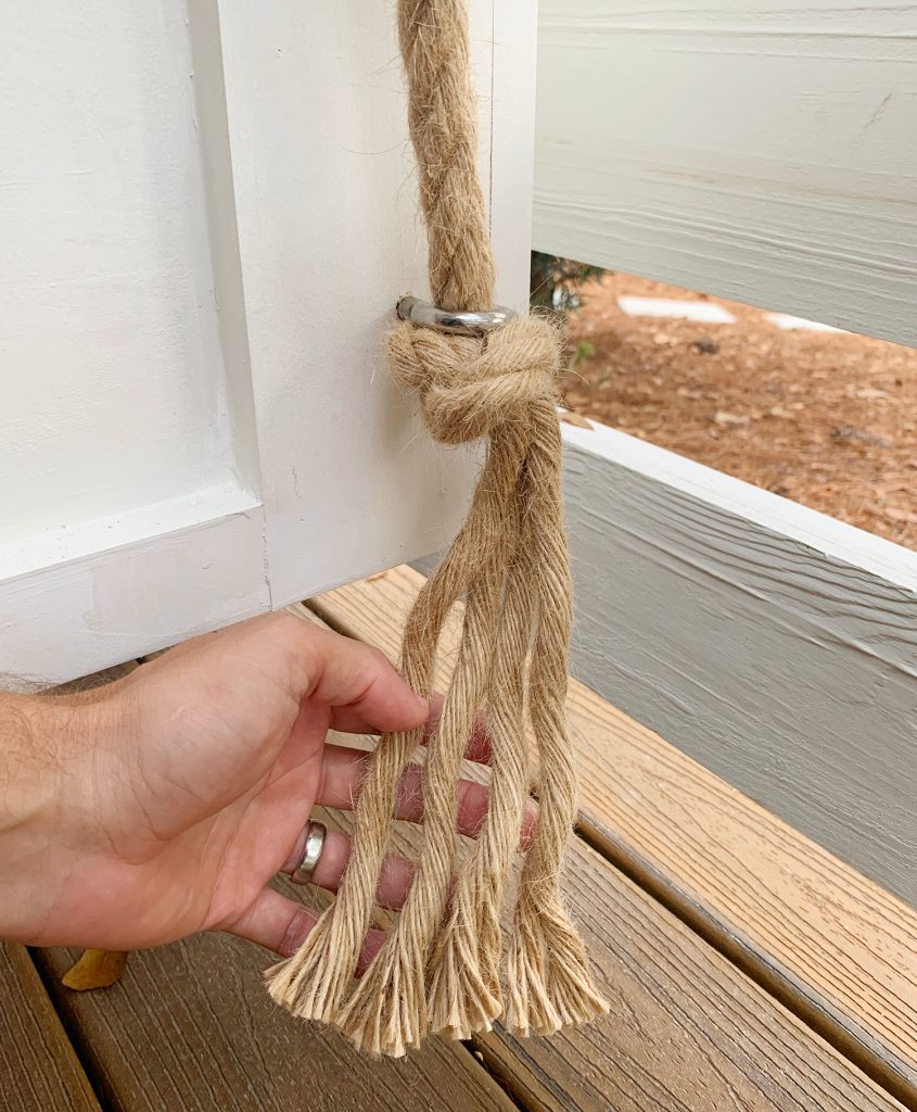 Frayed rope under the bottom of daybed eye hook
