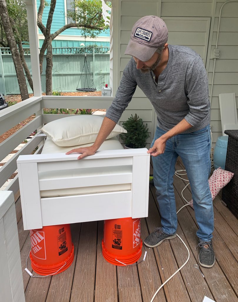 John constructed one side arm on hanging daybed