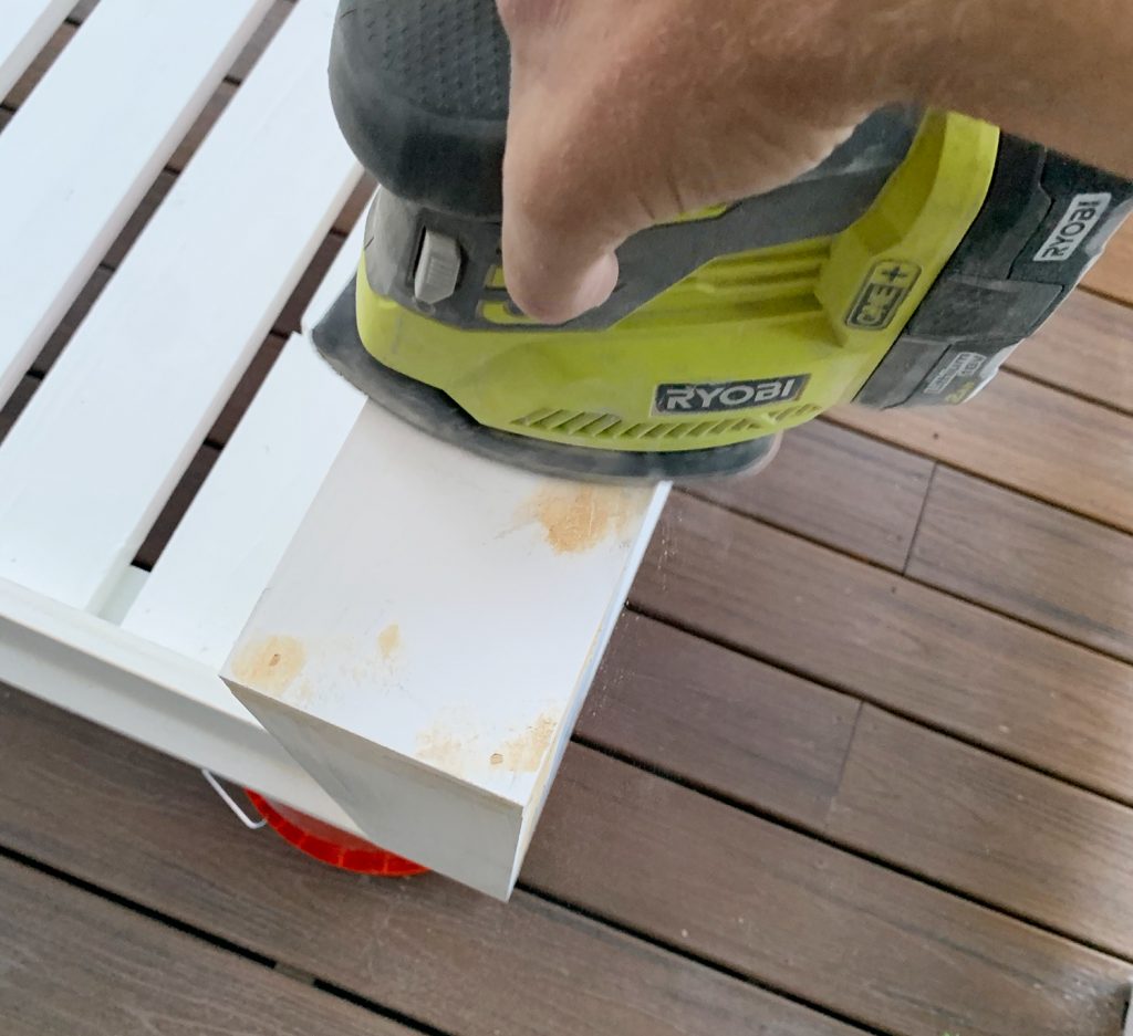 Sanding wood filler on daybed with ryobi palm sander