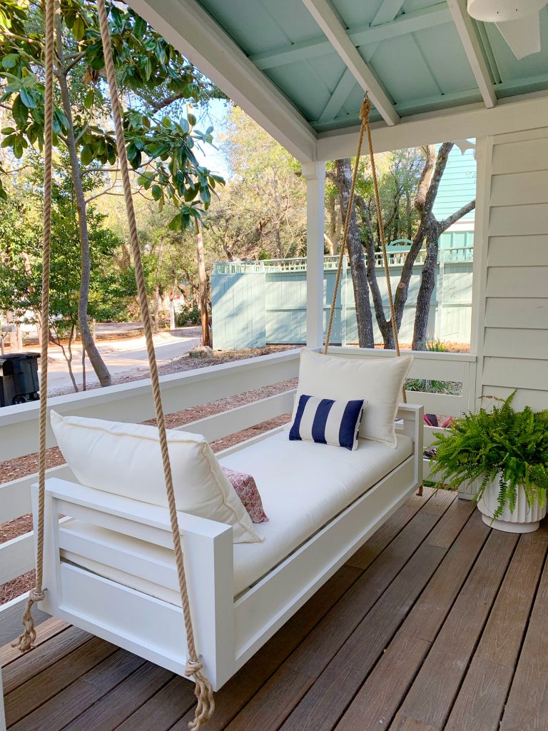 Angled View Of Finished Outdoor Hanging Daybed With White Cushions