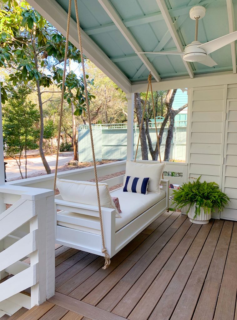 Angled View Of Finished Outdoor Hanging Daybed With White Cushions