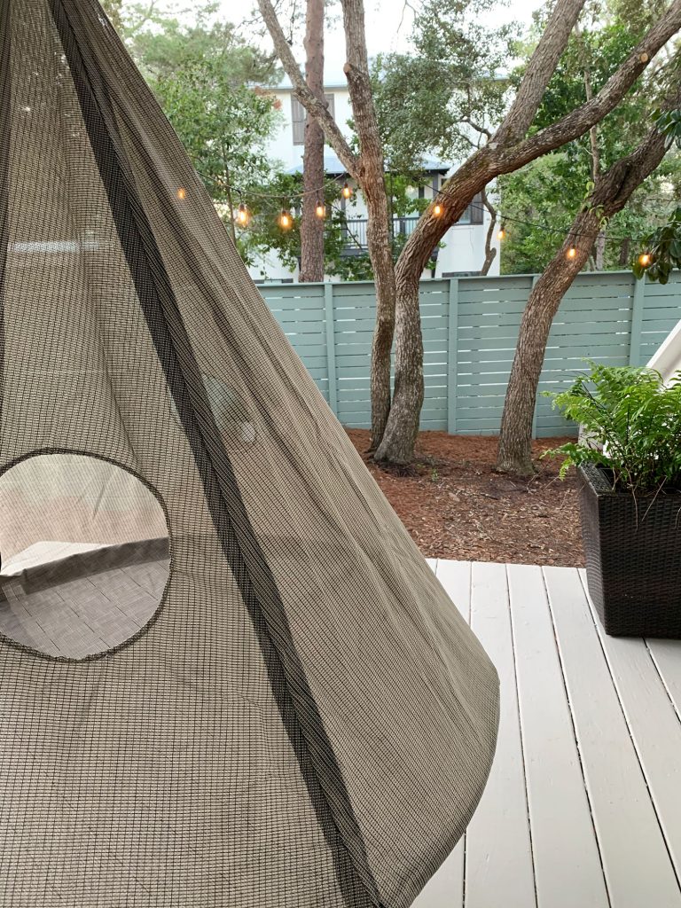 Detail of netted side of hanging porch tent