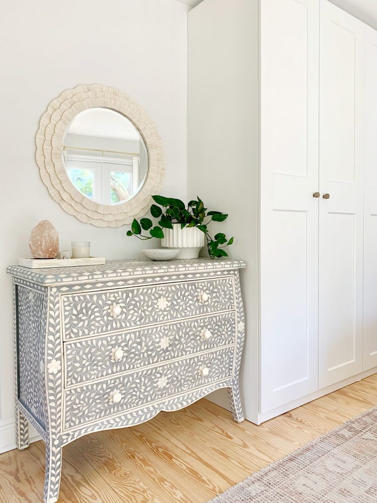 Blue inlay dresser next to Ikea Pax wardrobes with white bone inlay mirror