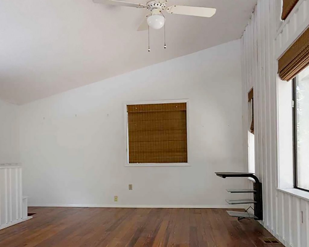 Before Photo of Upstairs Family Room With Vaulted Ceilings And Window BLinds