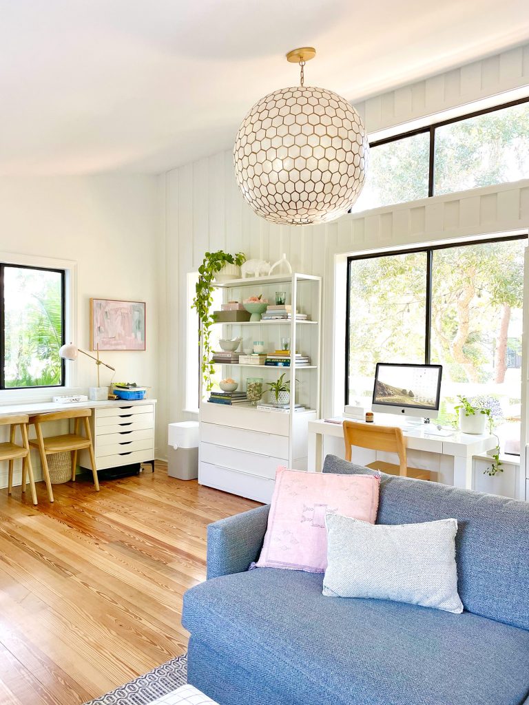 Serena & Lily Capiz Chandelier In Modern Upstairs Family Room With Hardwood Floors