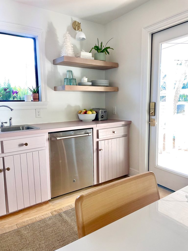 Vertical view of corner cabinets with floating shelves and reconstructed cabinet