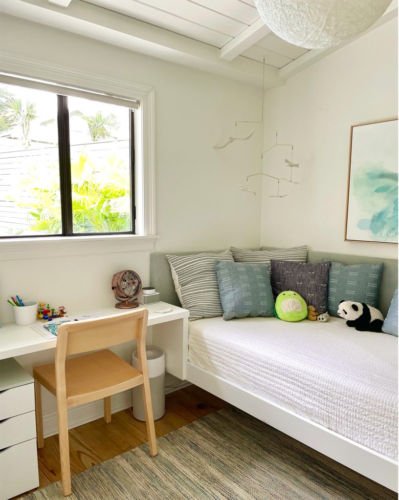 Kids Bedroom With Desk And Daybed With Upholstered Headboard