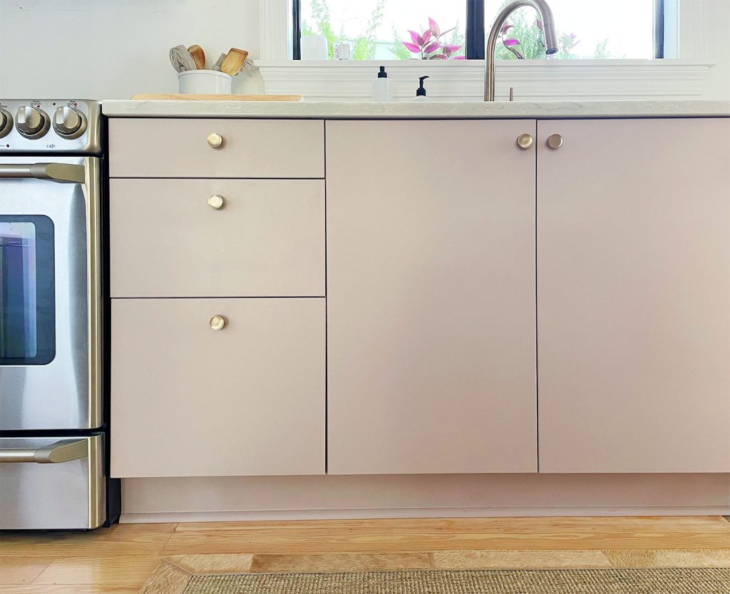 Mauve Painted Ikea VEDDIGNE Cabinets With Brass Hardware Detail