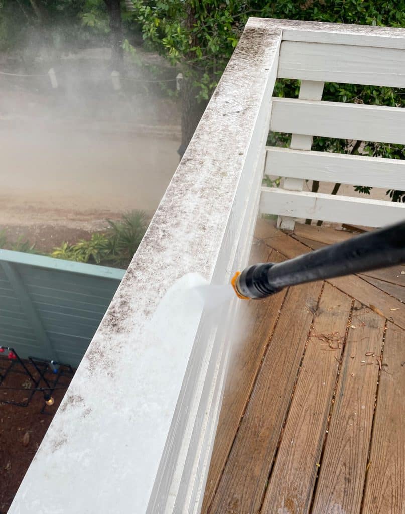 Pressure Washing White Painted Railings On Deck