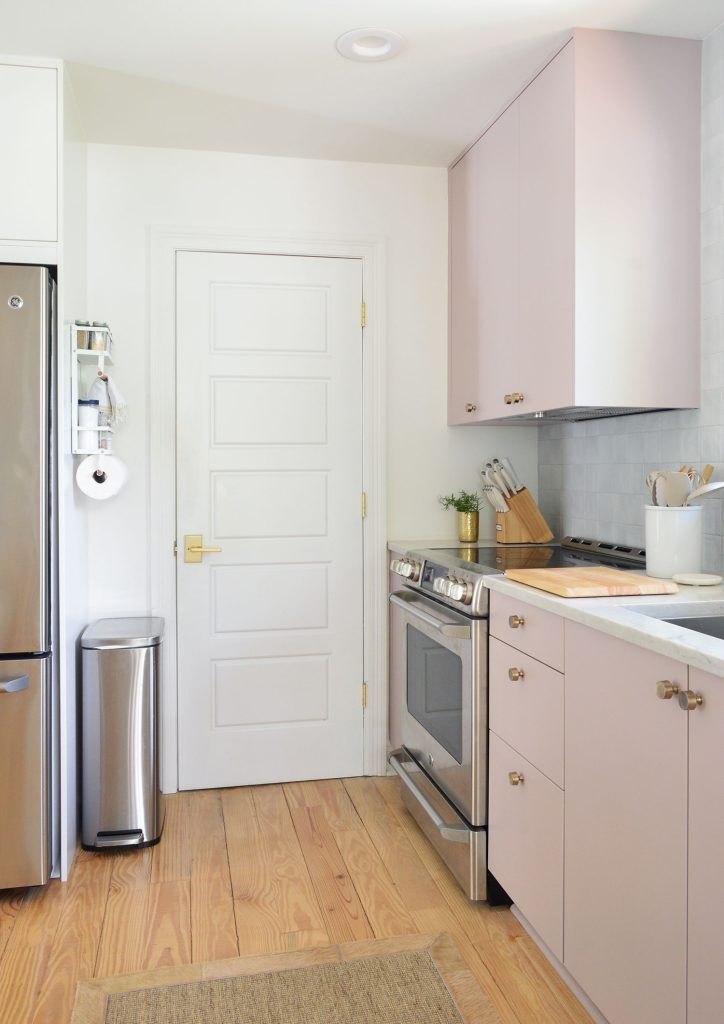 Mauve Ikea Kitchen Cabinets With Utility Closet Door Next To Stove