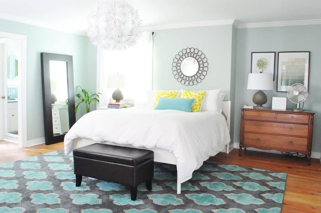 Colorful blue bedroom with no headboard