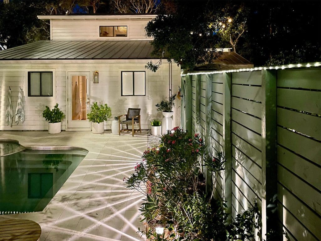 Solar LED Fairy Lights Along Top Of Fence Near Backyard Pool