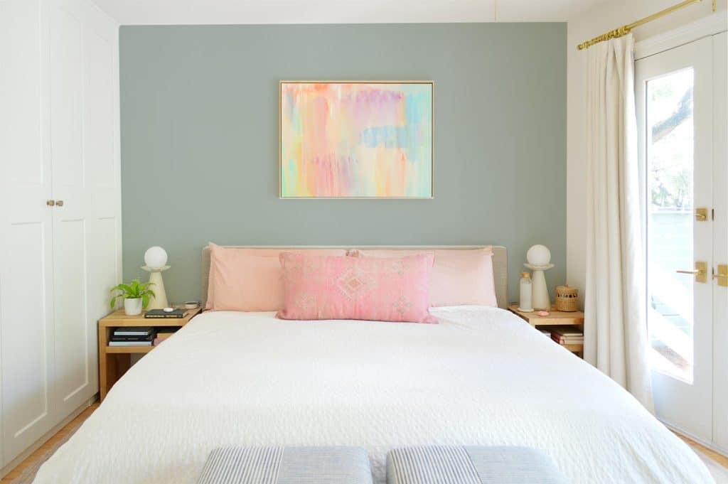 Photo Mock Up Of Muted Blue Wall Behind King Platform Bed