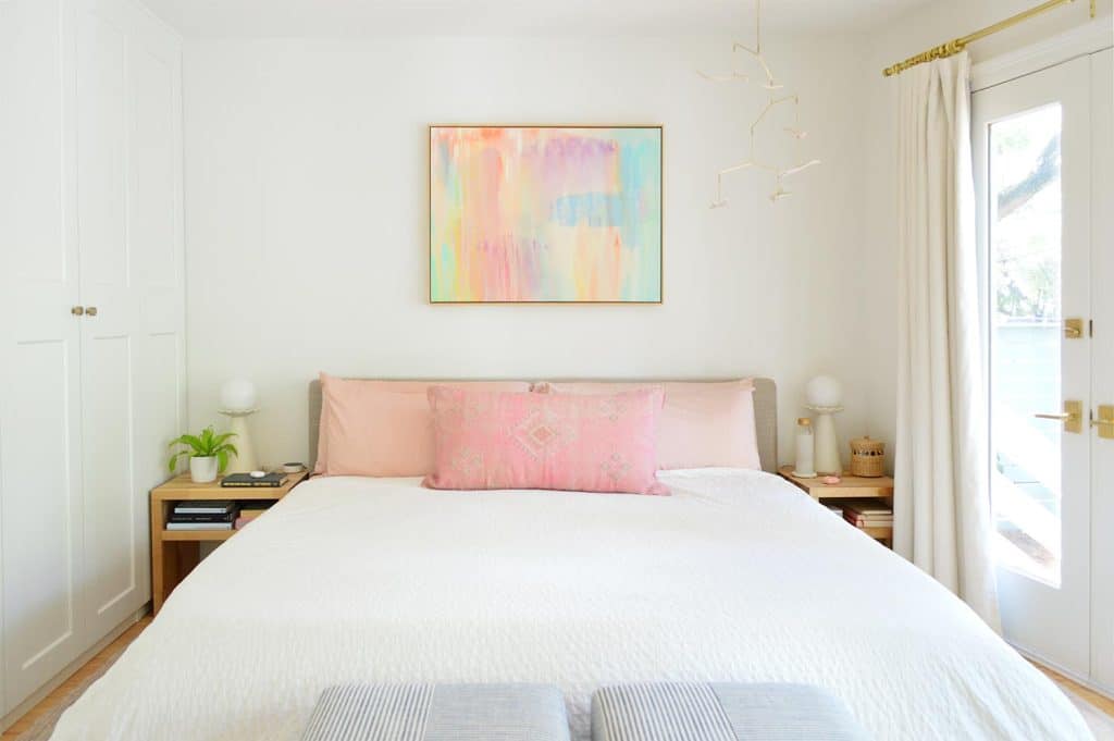Bright Modern Bedroom With Platform King Bed And Colorful Abstract Painting