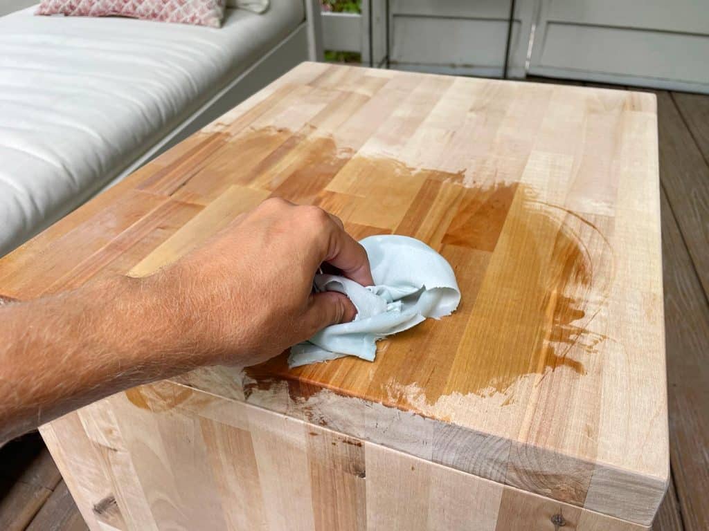 Applying Cutting Board Oil To Seal Butcher Block Bedside Table