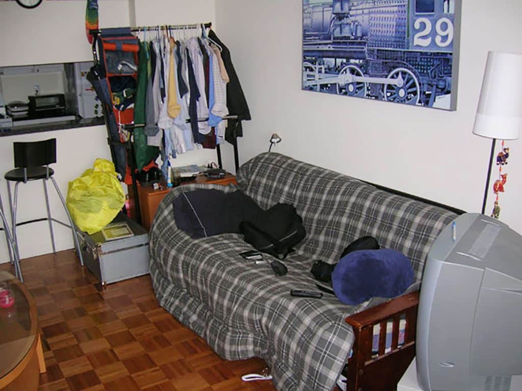 Cramped NYC Apartment Futon With Clothing Rack