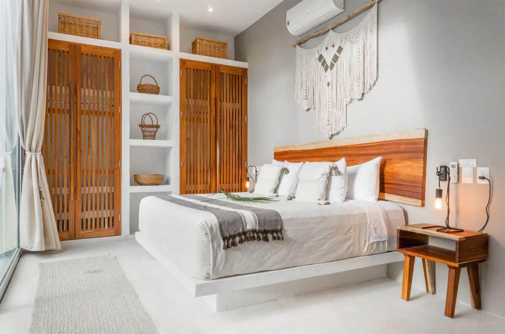 King Size Bed In Tulum Mexico Airbnb With White Wall And Wood Accents