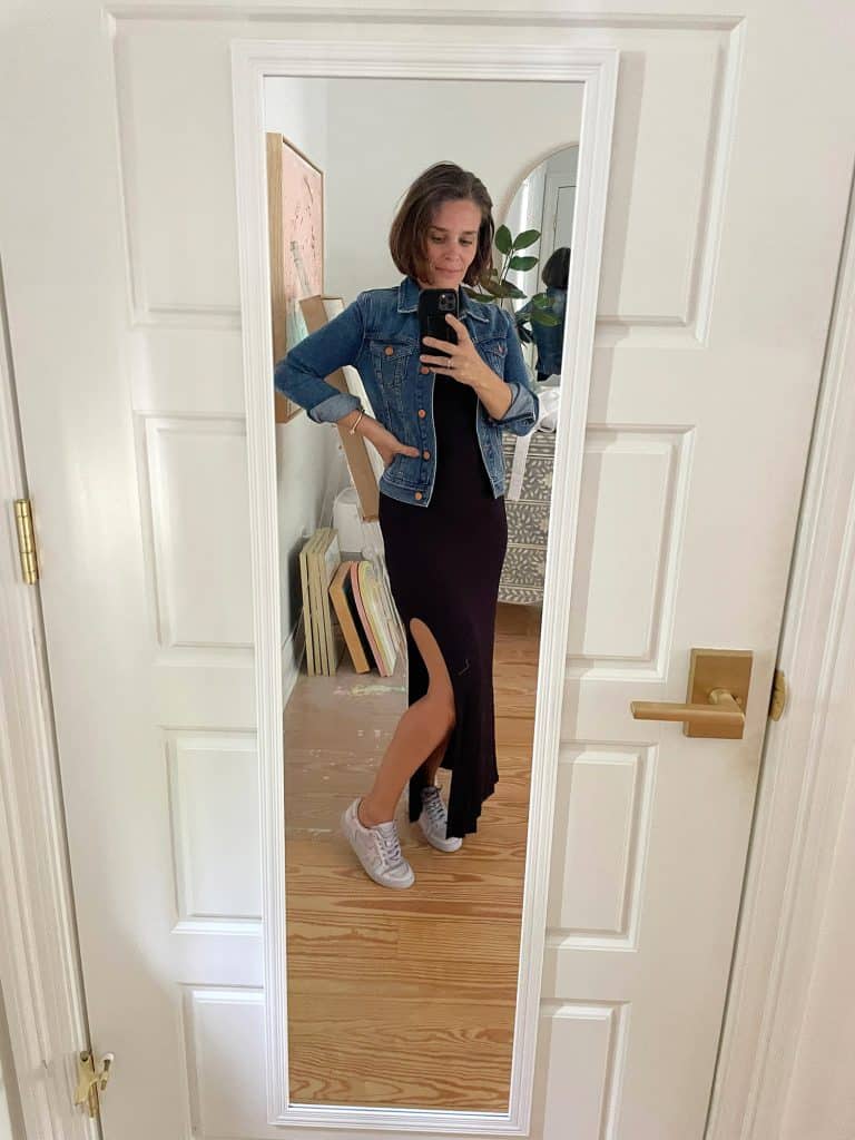Sherry selfie in mirror at home with long black dress and jean jacket and tennis shoes