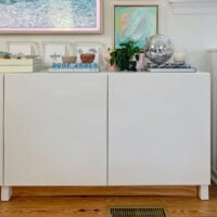 Ikea Besta Media Storage Cabinet With Photo Albums Inside