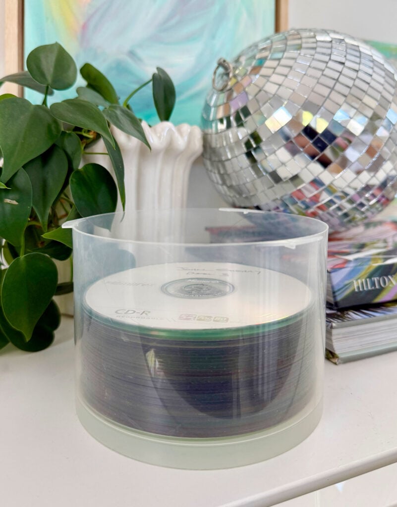 Stack of burned CDs containing old photos