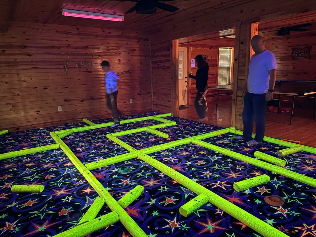Indoor Blacklight Mini Golf at Airbnb Cabin in Pigeon Forge TN