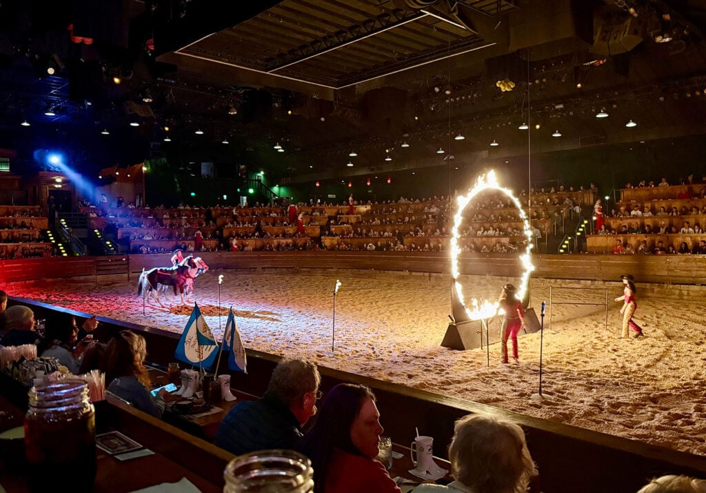 Horse Riding Stunt Through Flaming Ring of Fire at Dolly Stampede Dinner Show