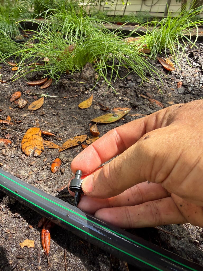 Poking Dripper Emitter Into Drip Irrigation System Tube