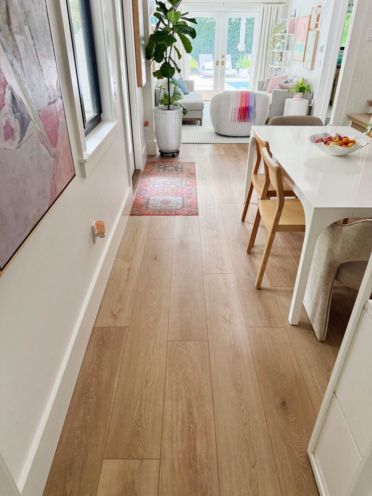 New LVP Floors Running Through Kitchen In Downstairs Renovation
