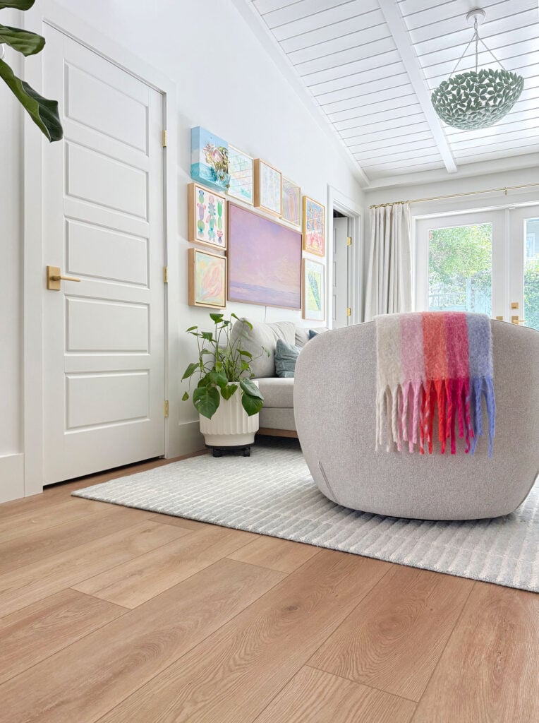 New LVP Floors In Renovation Near Lounge Chair