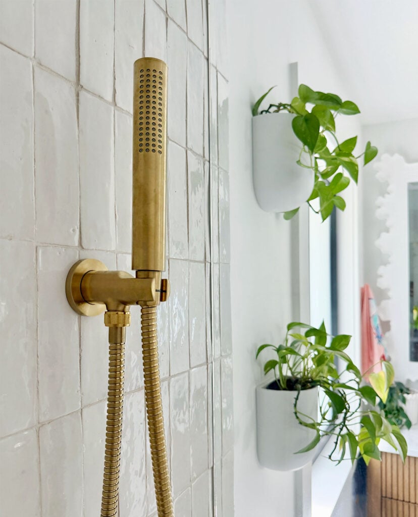 Close Up On Brass Body Sprayer In Shower