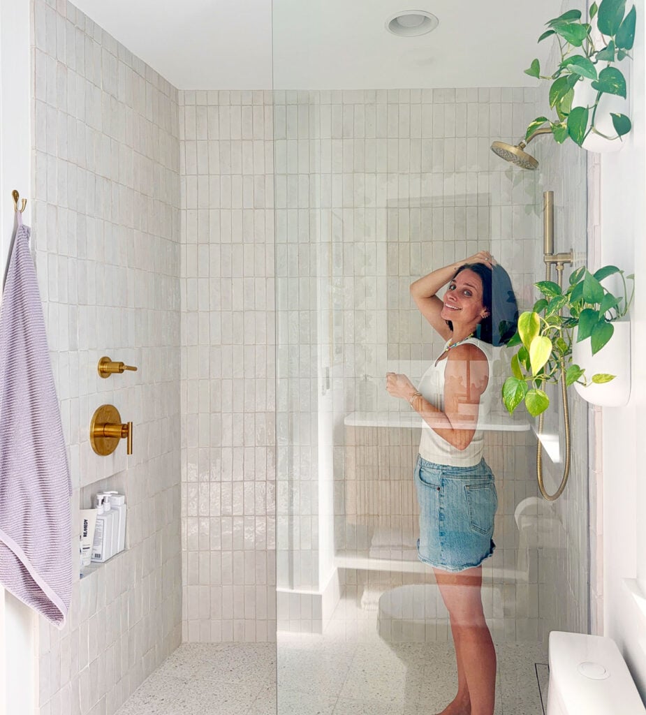 Sherry Standing In Bathroom Shower For Scale