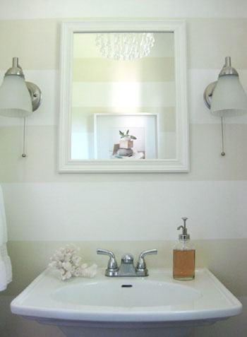 Bathroom With Subtle Stripe Paint Pattern On Walls Behind Pedestal Sink